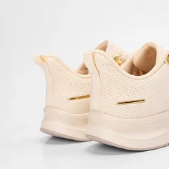 Tênis Esportivo Feminino Via Marte Knit Detalhes Metalizados Marfim